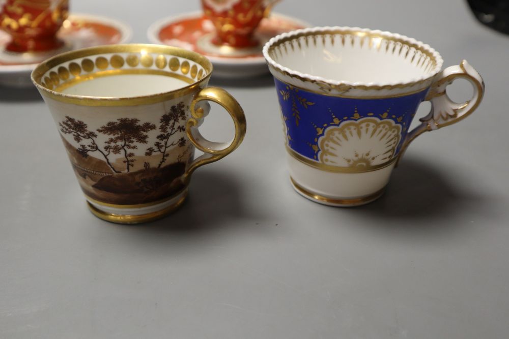 A pair of Chamberlain rare shaped cups and saucer, the handle with animal heads and two Chamberlain coffee cups, one with landscape and